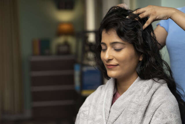 Woman hair massage at home